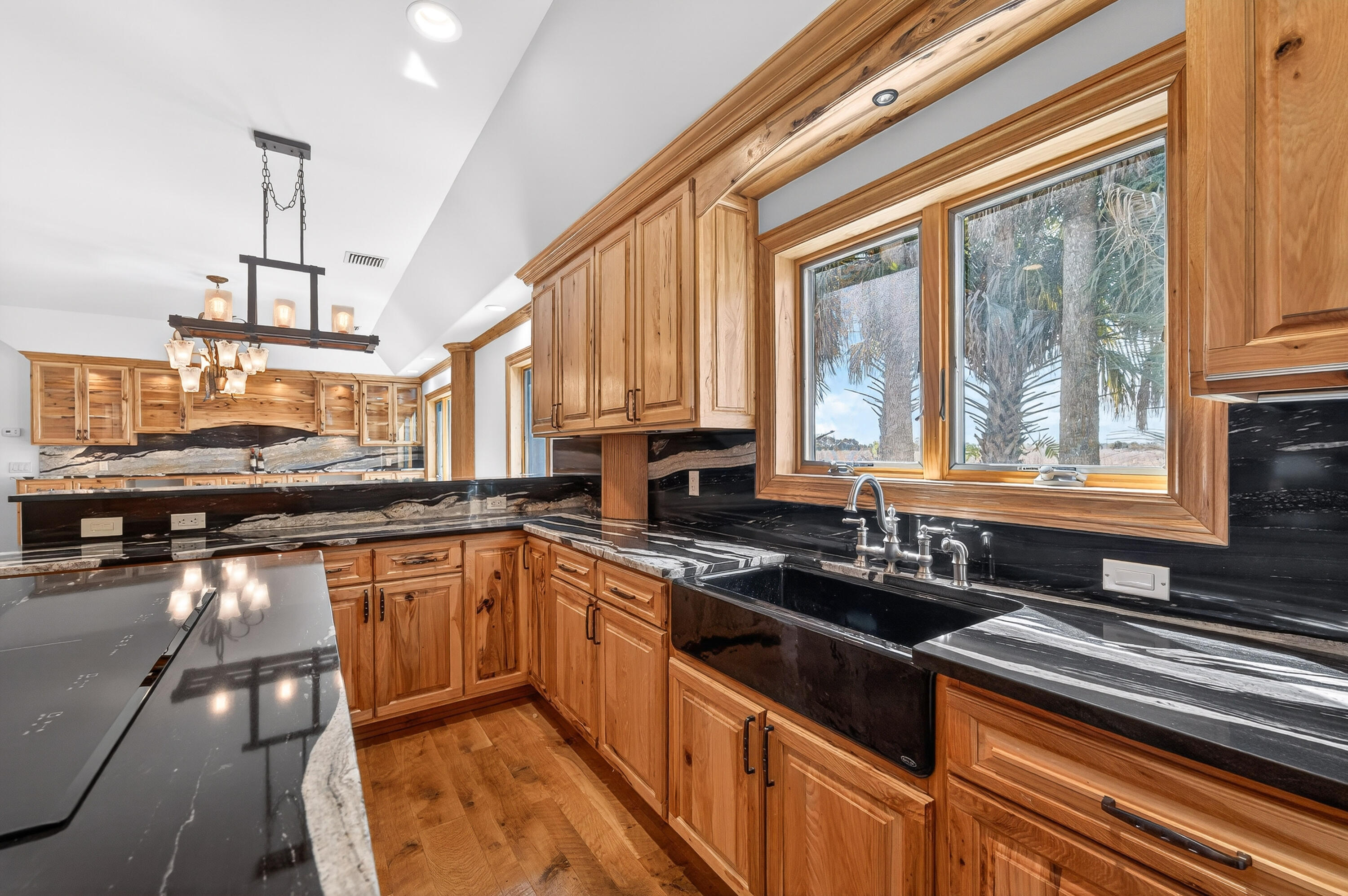 200 South Graves Road Fort Pierce, FL 34945 - Photo 24 of 58 a kitchen with a sink stove and cabinets