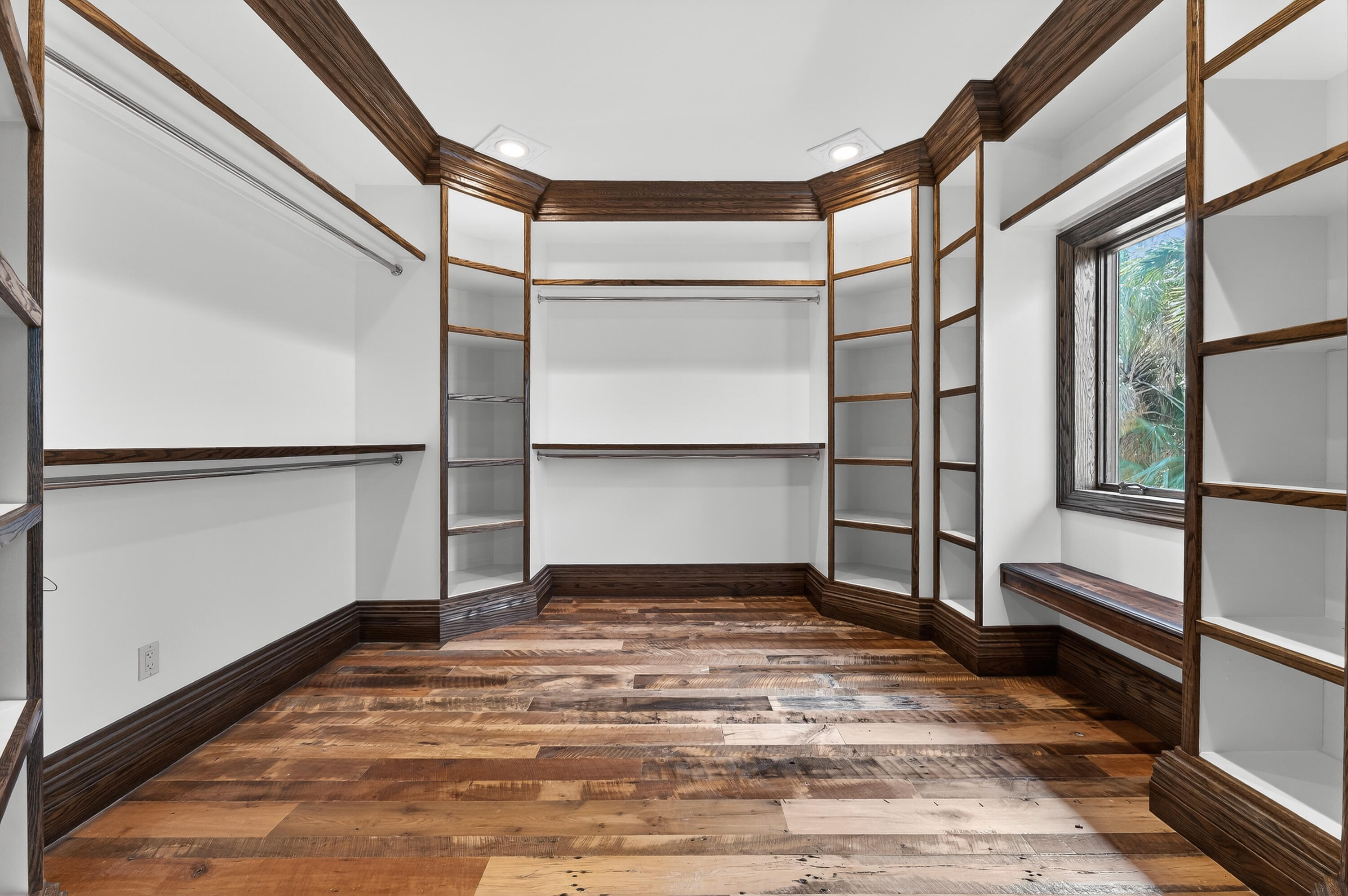 200 South Graves Road Fort Pierce, FL 34945 - Photo 36 of 58 a view of an empty room with wooden floor and a window