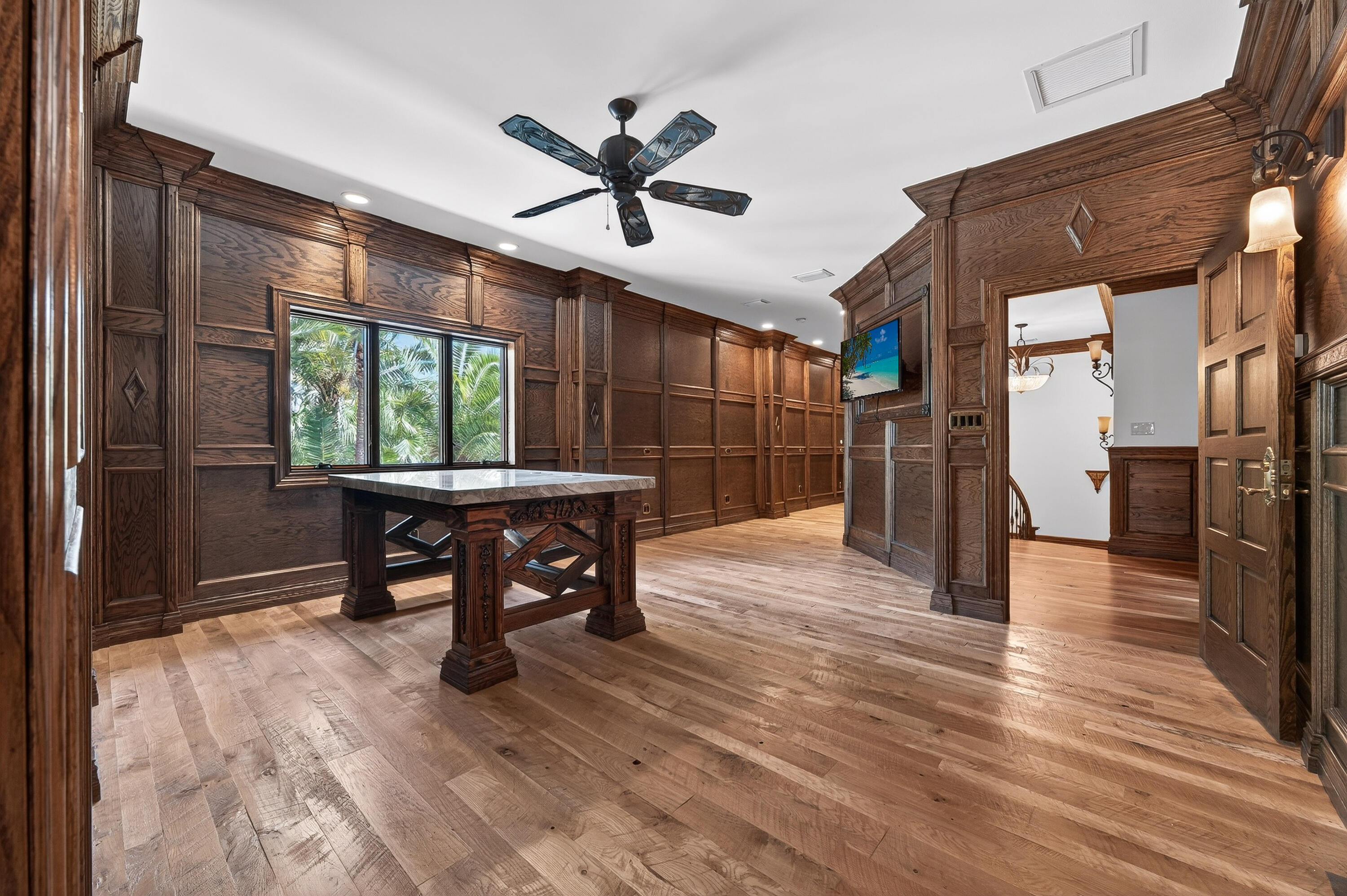 200 South Graves Road Fort Pierce, FL 34945 - Photo 38 of 58 a view of a workspace with furniture window and wooden floor