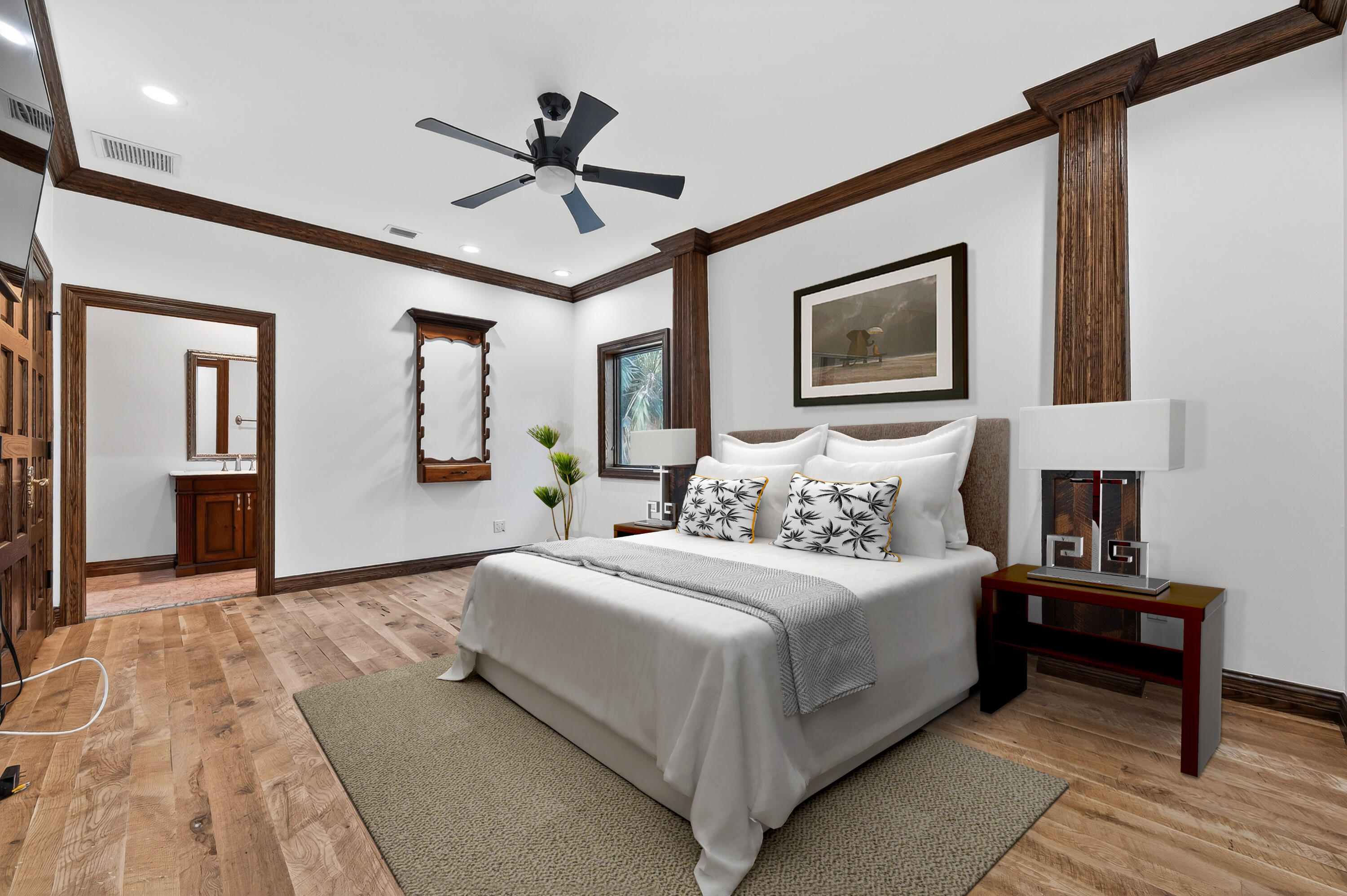 200 South Graves Road Fort Pierce, FL 34945 - Photo 41 of 58 a bedroom with a large bed chandelier and a window