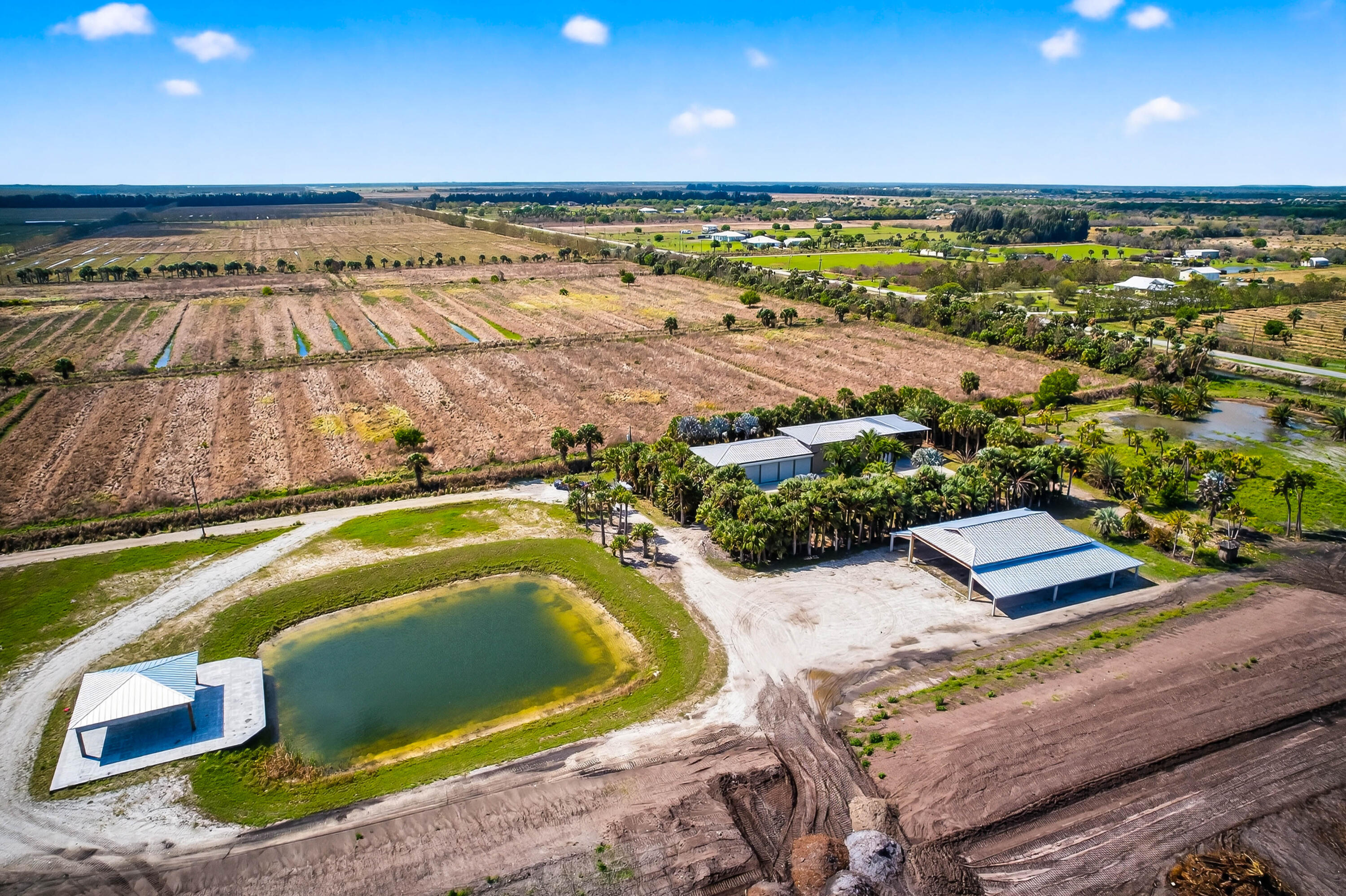 200 South Graves Road Fort Pierce, FL 34945 - Photo 48 of 58 a view of a swimming pool with an outdoor seating