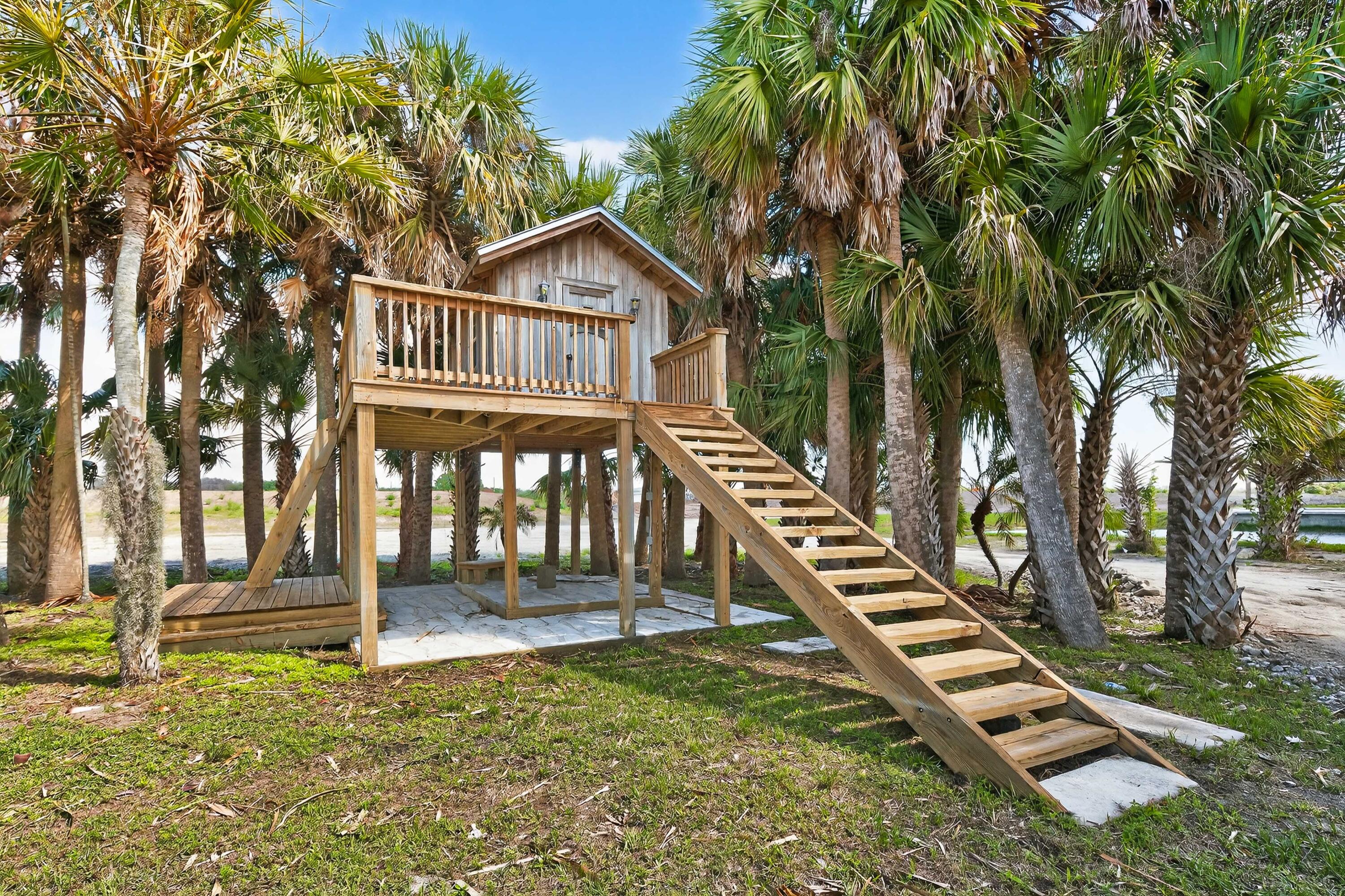 200 South Graves Road Fort Pierce, FL 34945 - Photo 57 of 58 a front view of a house with a yard