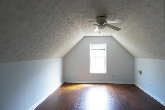 an empty room with a bathroom