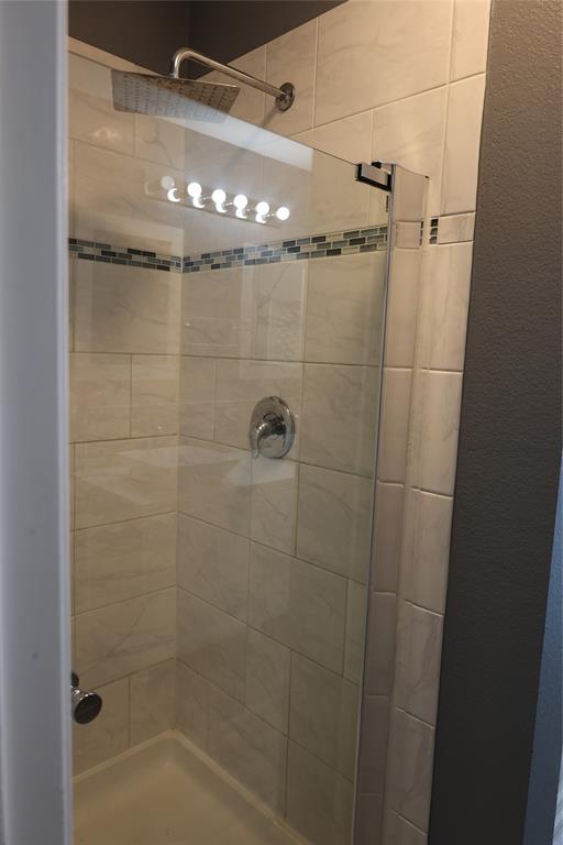 1714 Elm Street Anna, TX 75409 - Photo 13 of 27 a bathroom with a shower
