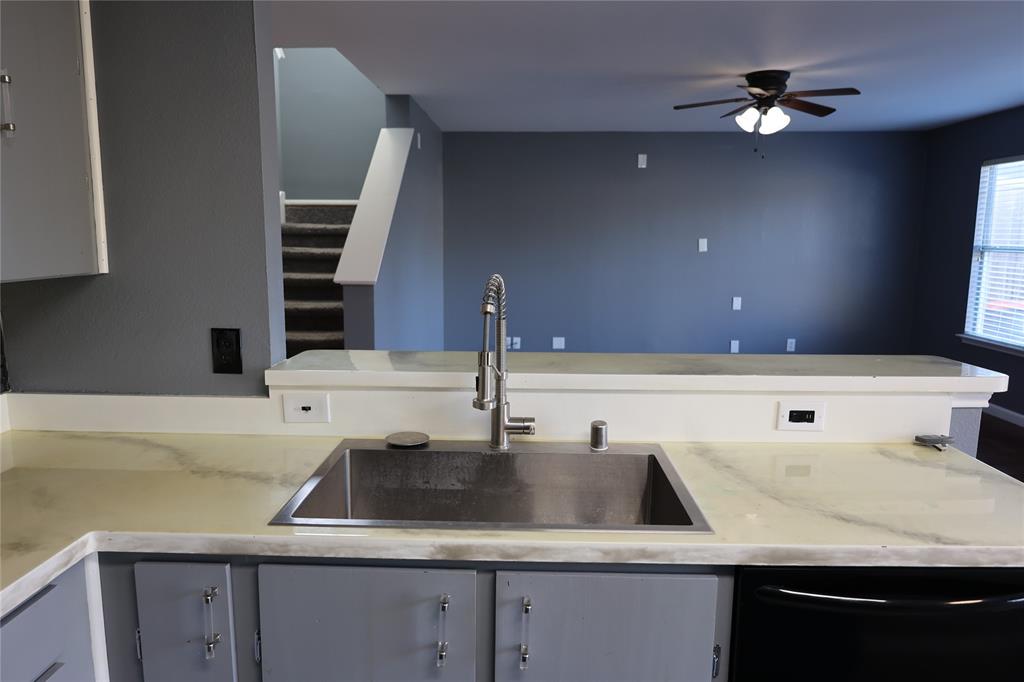 1714 Elm Street Anna, TX 75409 - Photo 4 of 27 a bathroom with a sink and a mirror