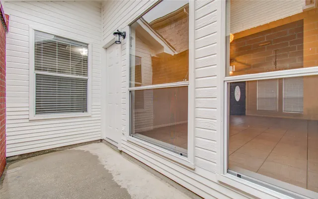 a view of a porch with a door