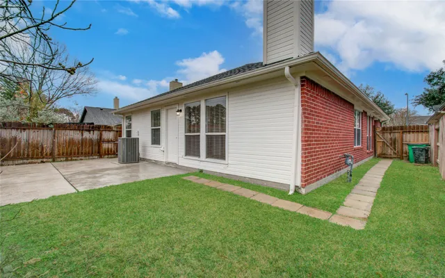 a view of a backyard with a garden