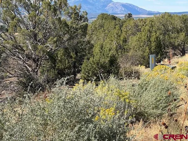 a view of a mountain with an outdoor space