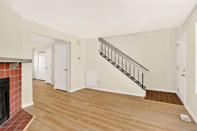 a view of entryway with wooden floor