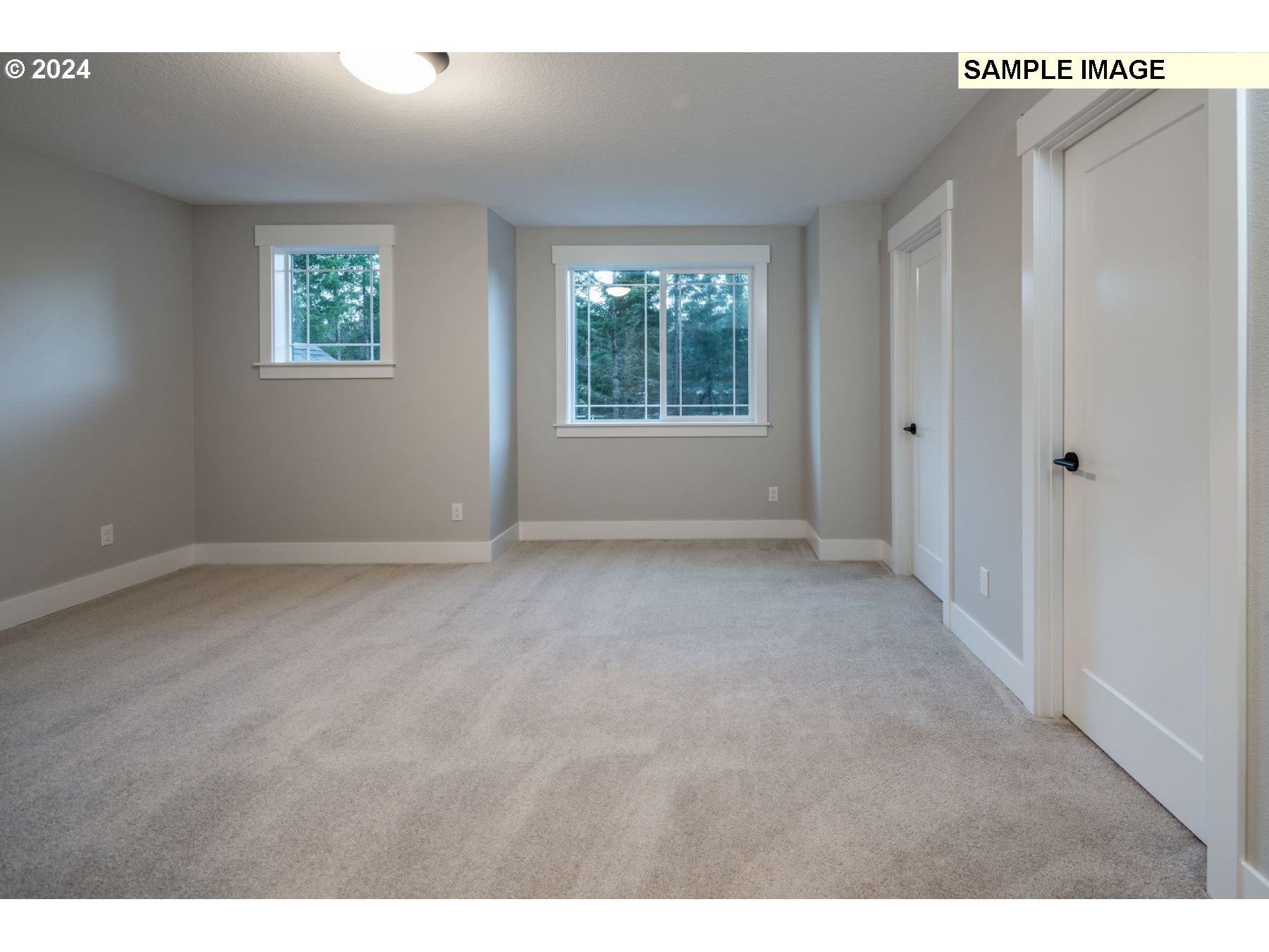 1202 South 46th Place Ridgefield, WA 98642 - Photo 14 of 25 a view of an empty room with a window