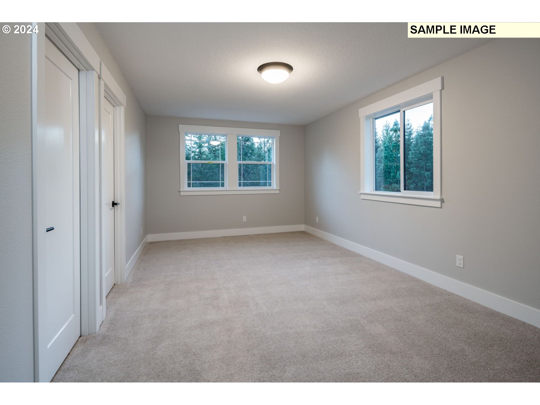 1202 South 46th Place Ridgefield, WA 98642 - Photo 19 of 25 a view of an empty room with a window