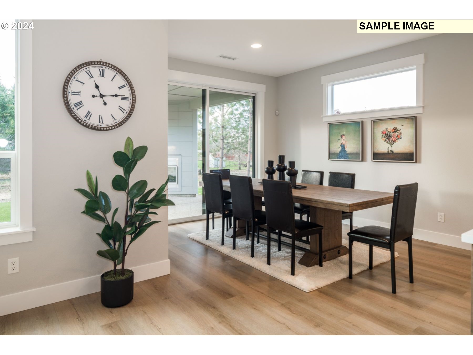 1202 South 46th Place Ridgefield, WA 98642 - Photo 7 of 25 a view of a dining area with furniture and a large window