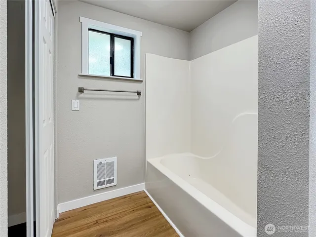 a bathroom with a bathtub