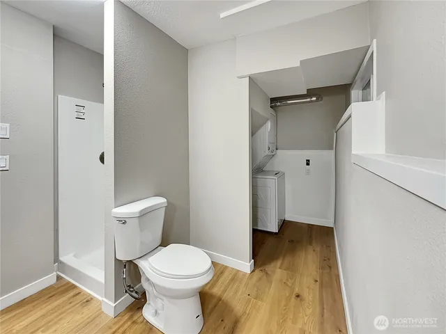 a bathroom with a toilet and a sink