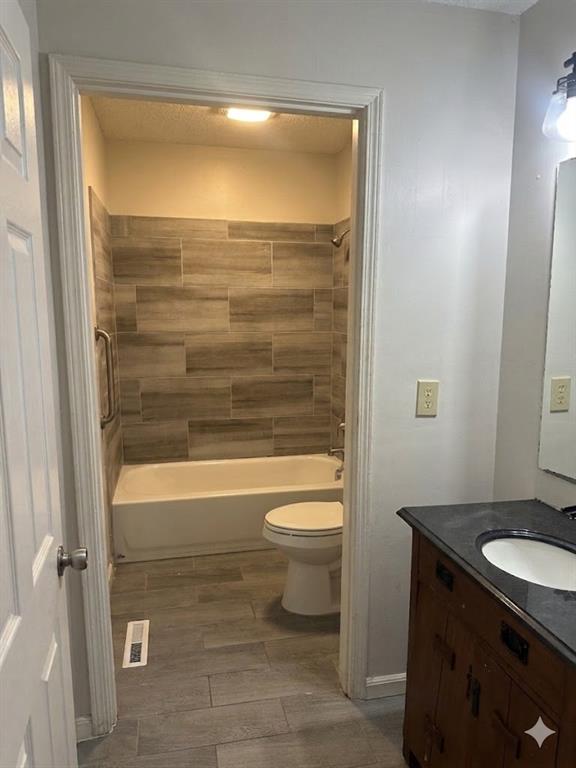 27 Carriage Trace Southeast Cartersville, GA 30121 - Photo 18 of 26 a bathroom with a granite countertop toilet a sink and bathtub