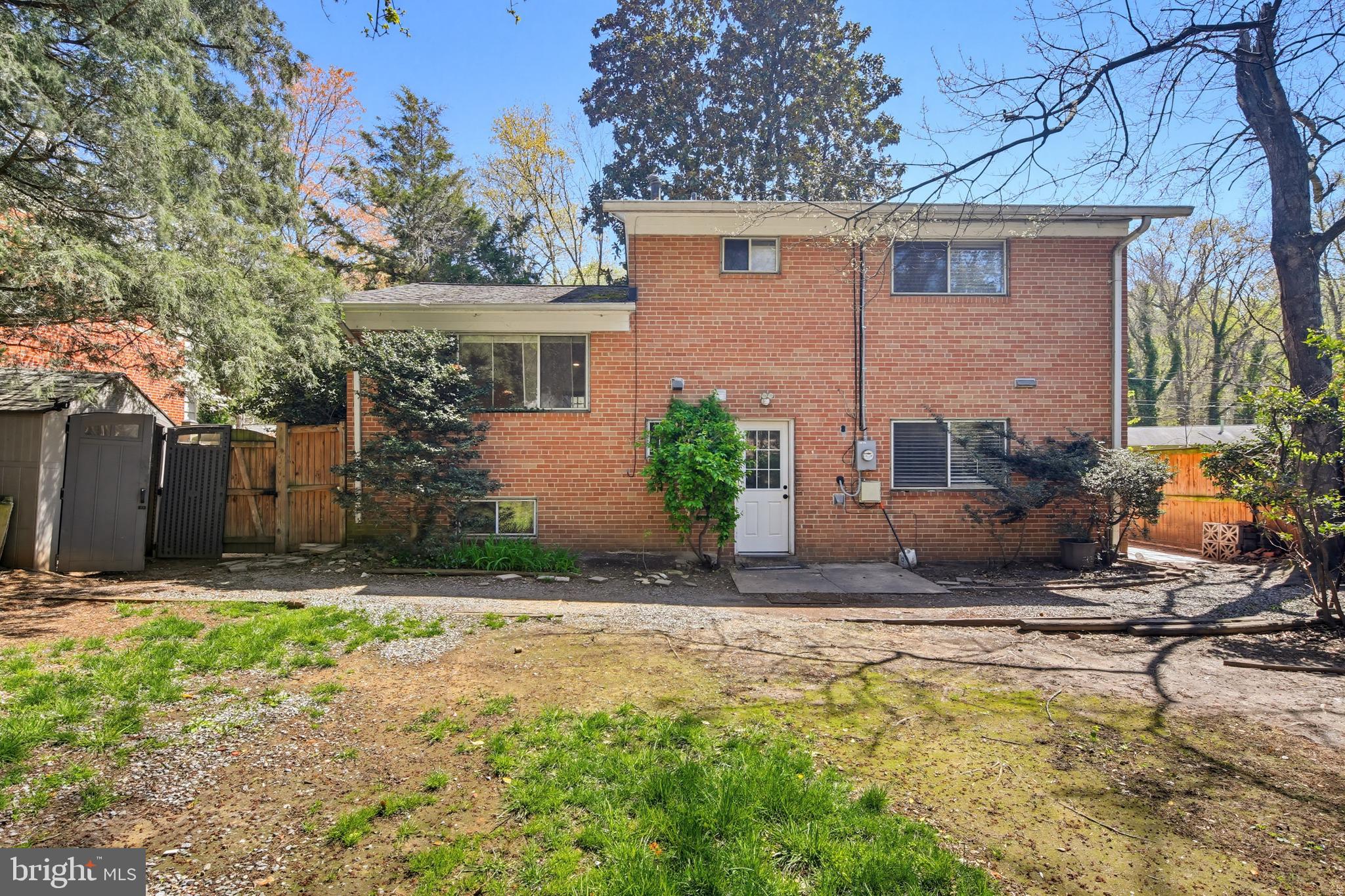 9717 Hedin Drive Silver Spring, MD 20903 - Photo 32 of 36 a view of a house with a yard