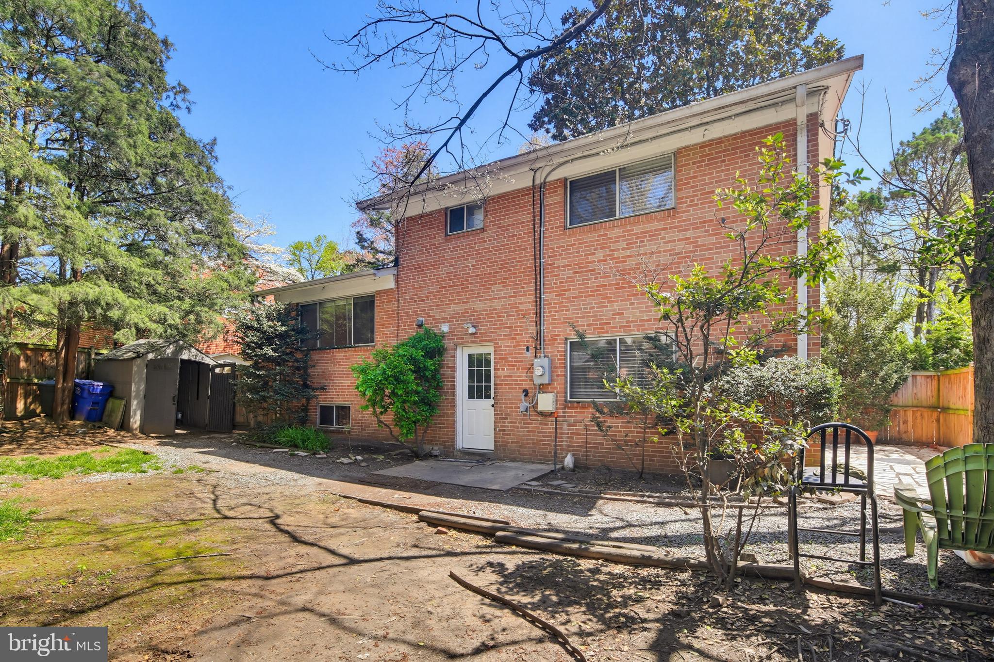 9717 Hedin Drive Silver Spring, MD 20903 - Photo 33 of 36 a view of a house with a yard