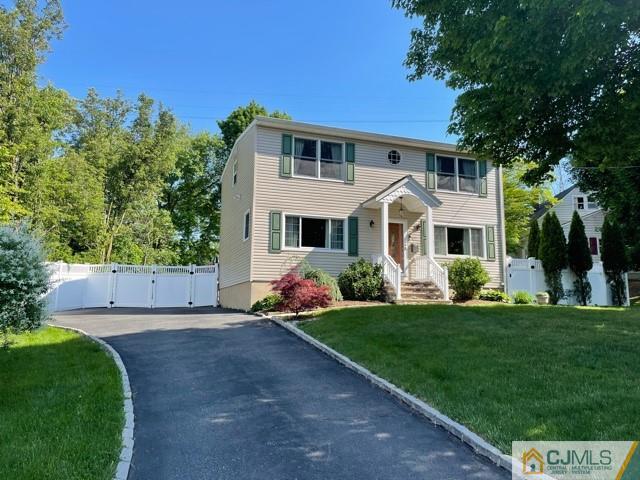 5 Bowser Road New Brunswick, NJ 08901 - Photo 1 of 45 a front view of a house with a yard