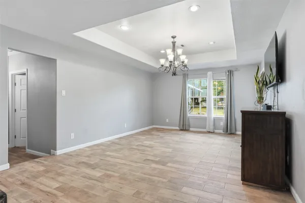 a view of a dining room with furniture