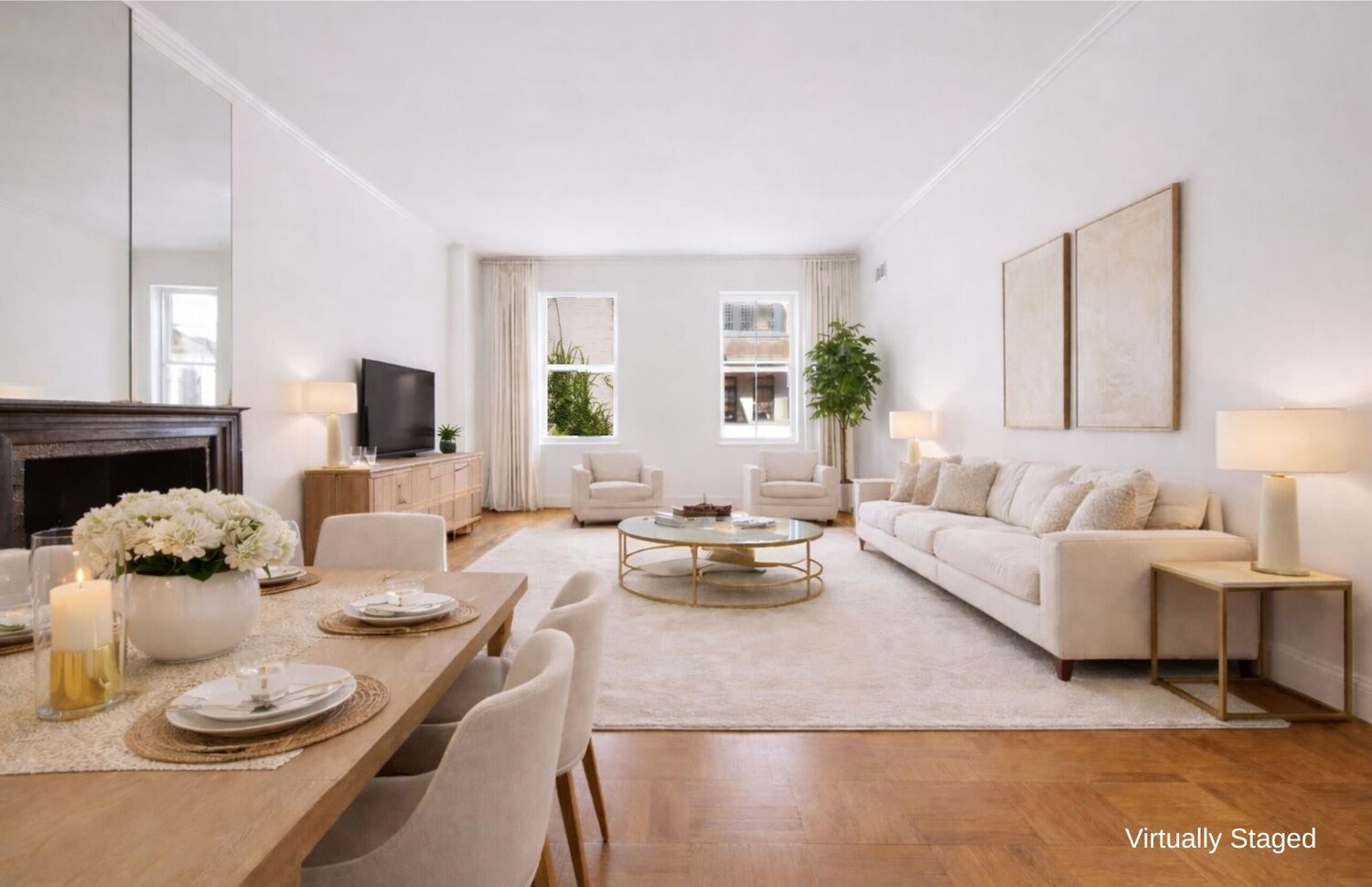 a living room with furniture potted plant and a window