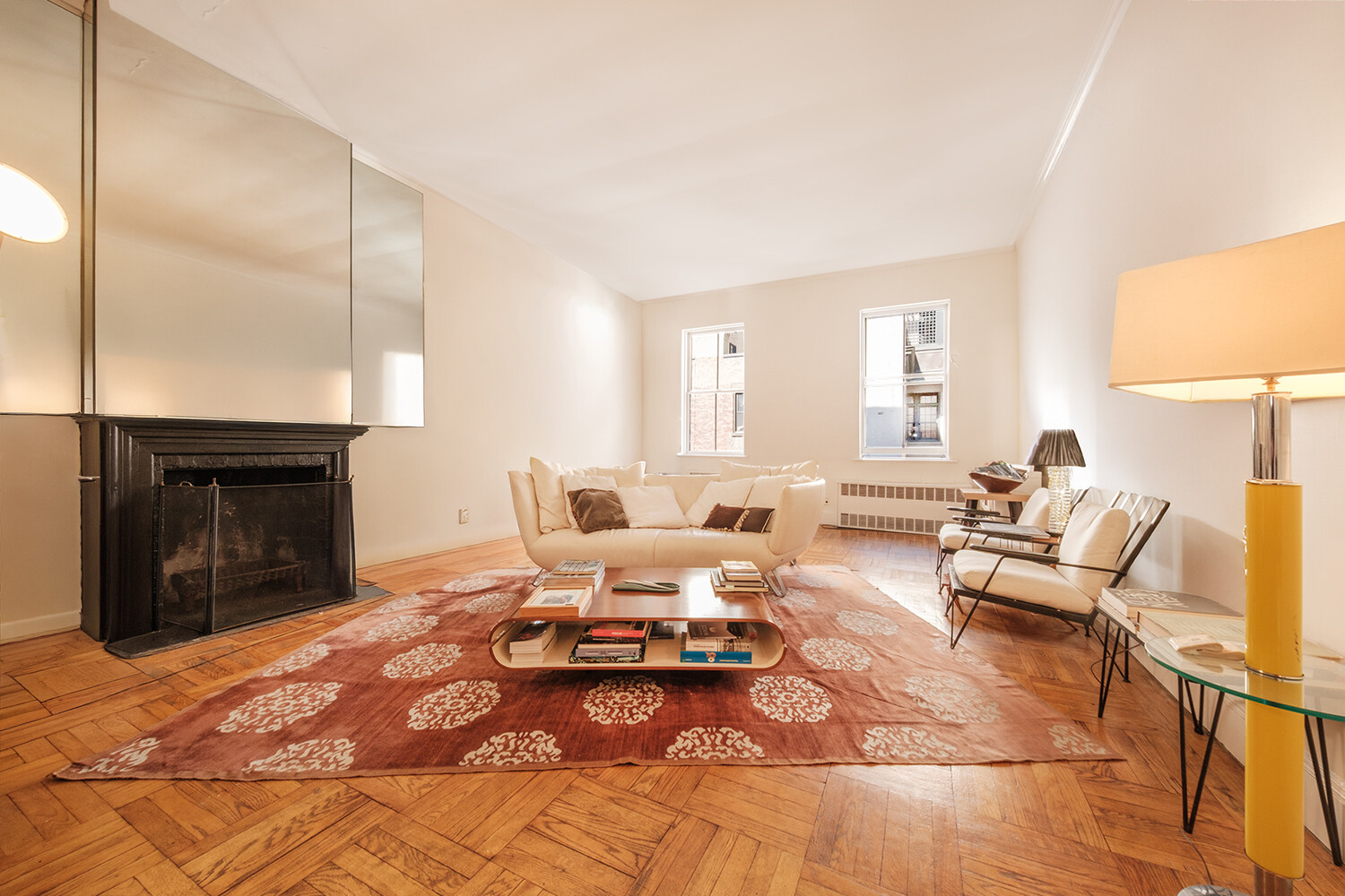 25 East 69th Street, Unit 5B Manhattan, NY 10021 - Photo 6 of 22 a living room with furniture or fireplace and a table