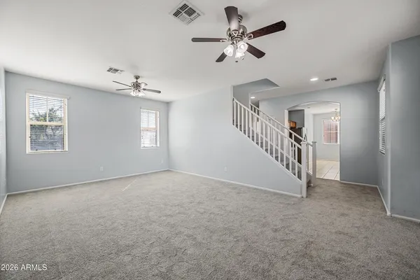 a bathroom with a sink toilet vanity and shower