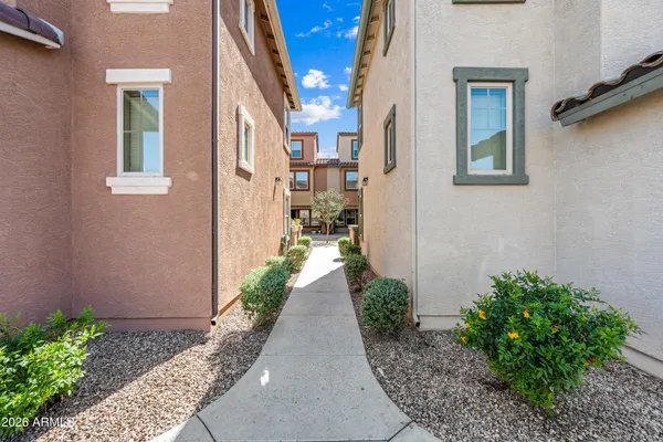 a black and white photo of a bench
