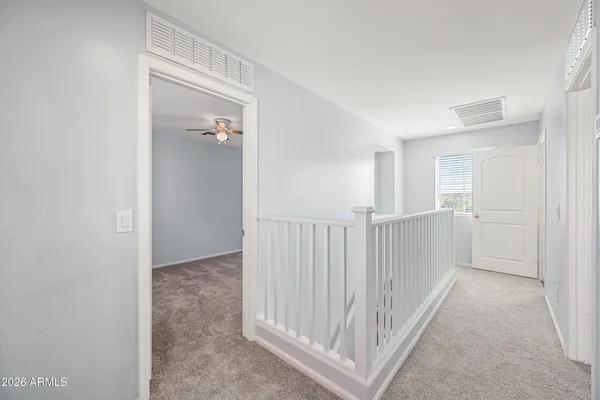 a bathroom with a granite countertop sink a large mirror and a