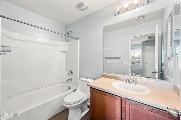 a view of a hallway with closet
