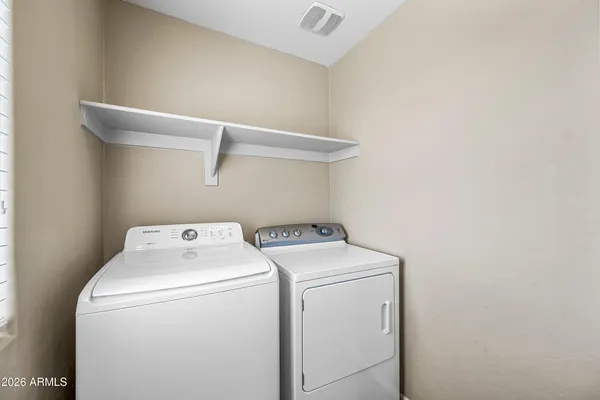 an empty room with a bathroom