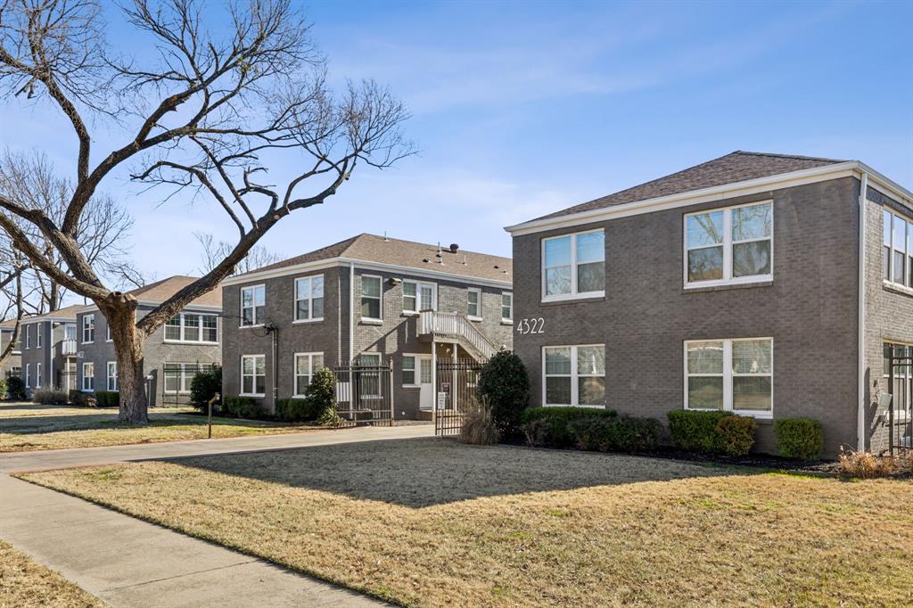 4402 Swiss Avenue Dallas, TX 75204 - Photo 3 of 11 a front view of a building with a yard