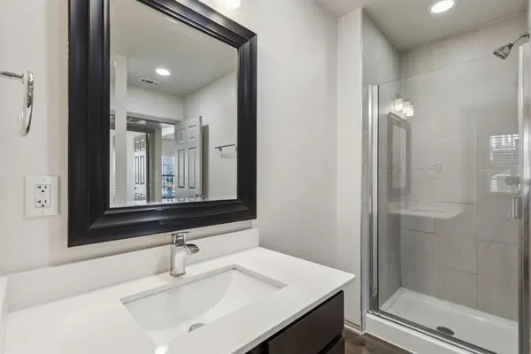 a bathroom with a sink and a mirror