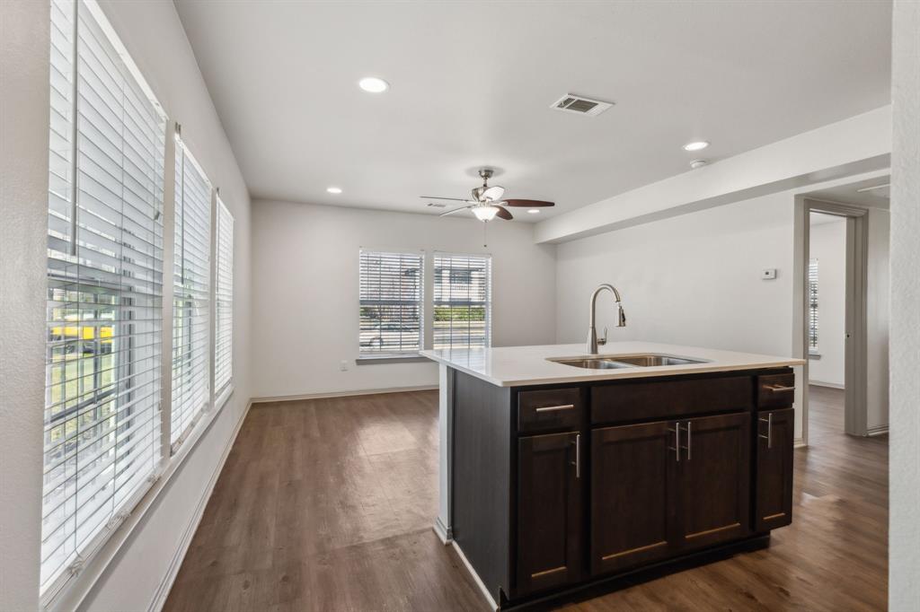 4402 Swiss Avenue Dallas, TX 75204 - Photo 8 of 11 a view of kitchen with sink and wooden floor
