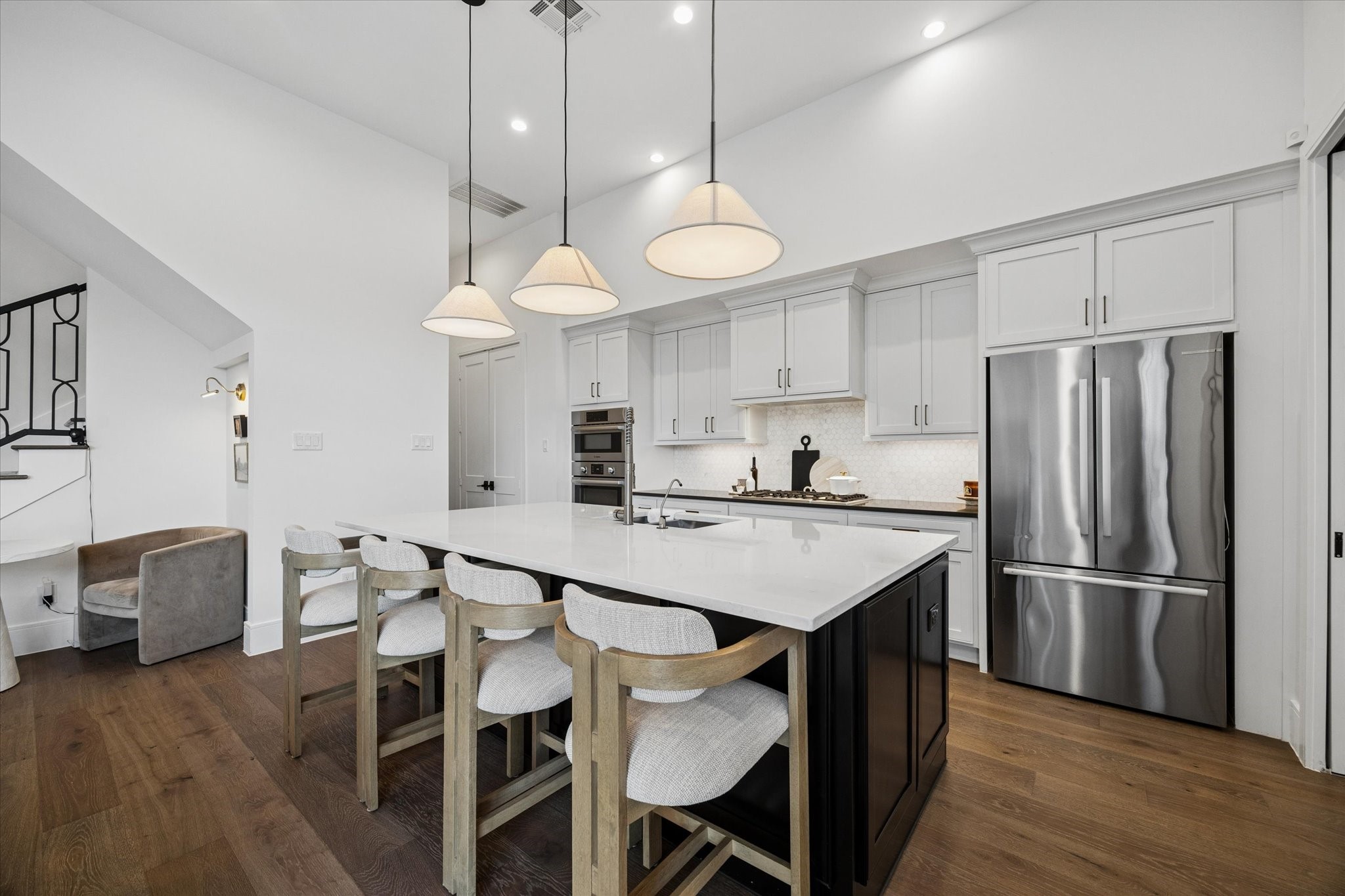 1661 Bingle Road Houston, TX 77055 - Photo 6 of 33 quartz countertops, fabric cone pendant lighting, drop in SS sink, gooseneck wand faucet.