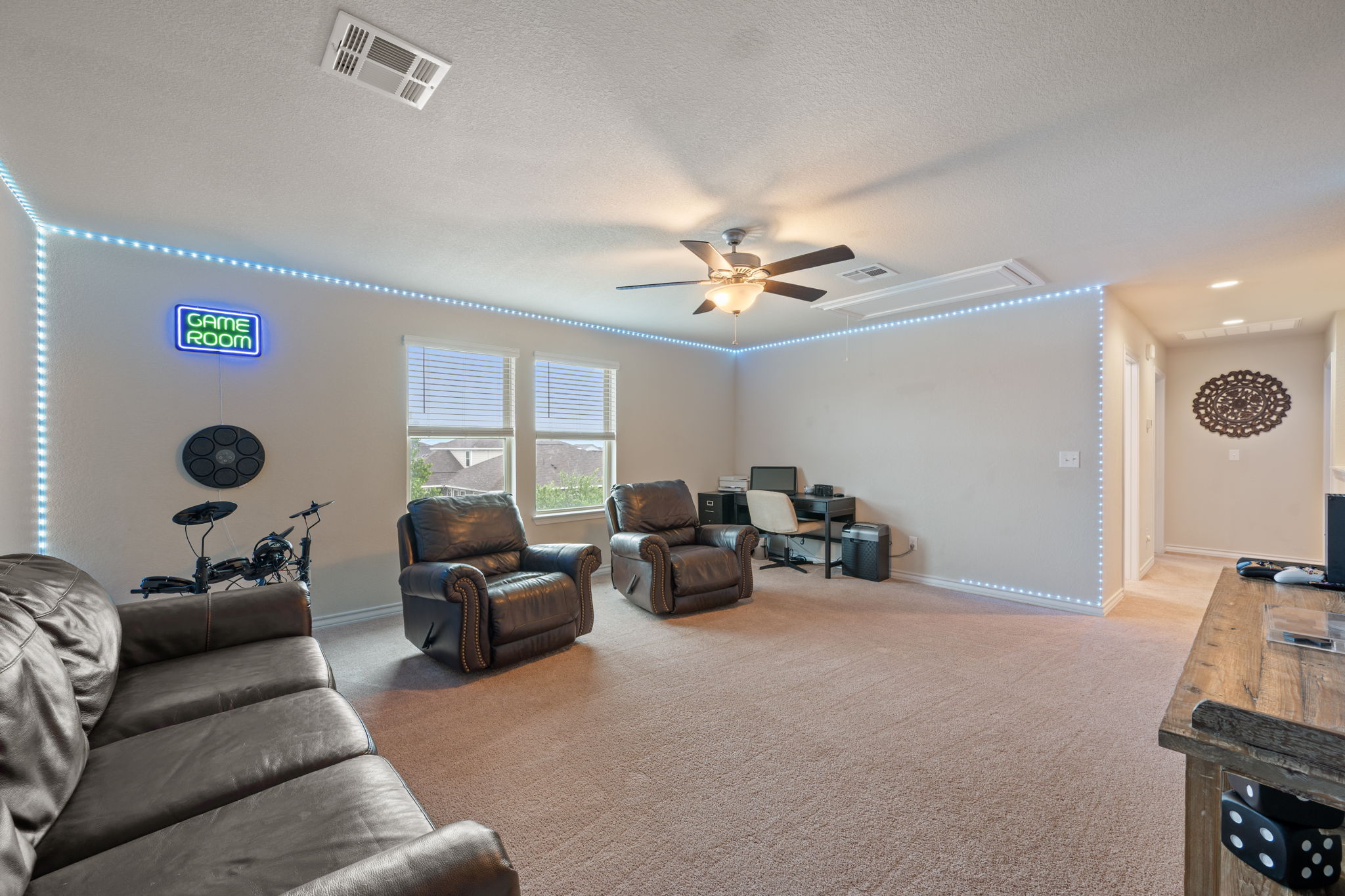409 Limestone Road Liberty Hill, TX 78642 - Photo 22 of 35 a living room with furniture and a window