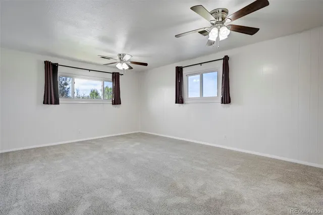 a view of a hallway with front door