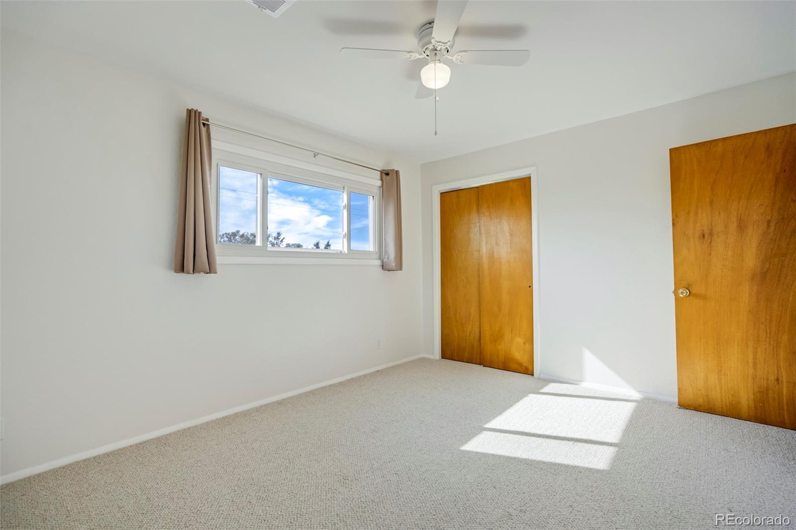 1284 Thompson Street Limon, CO 80828 - Photo 20 of 49 a view of an empty room with window