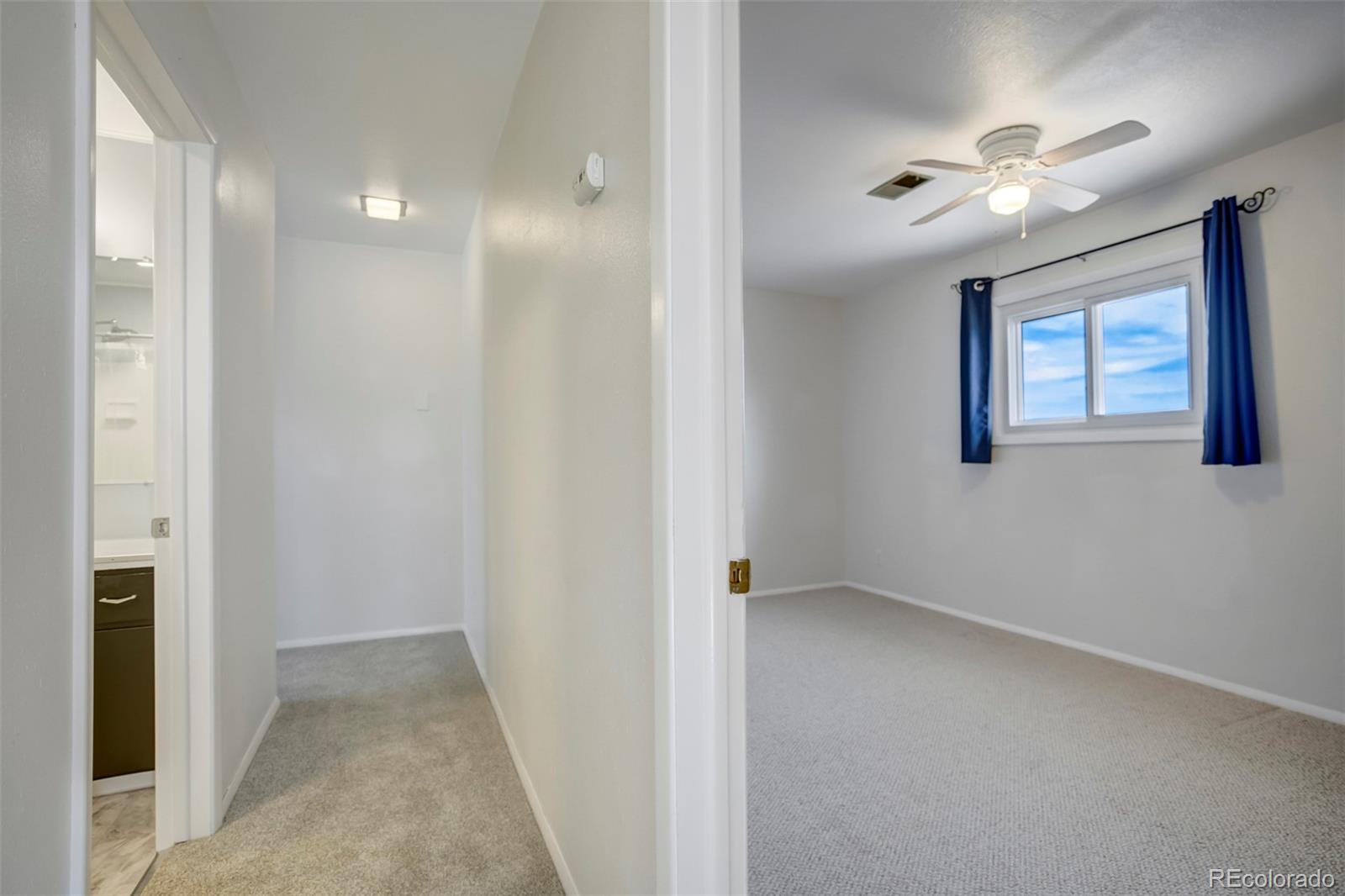 1284 Thompson Street Limon, CO 80828 - Photo 22 of 49 a view of an empty room with a window