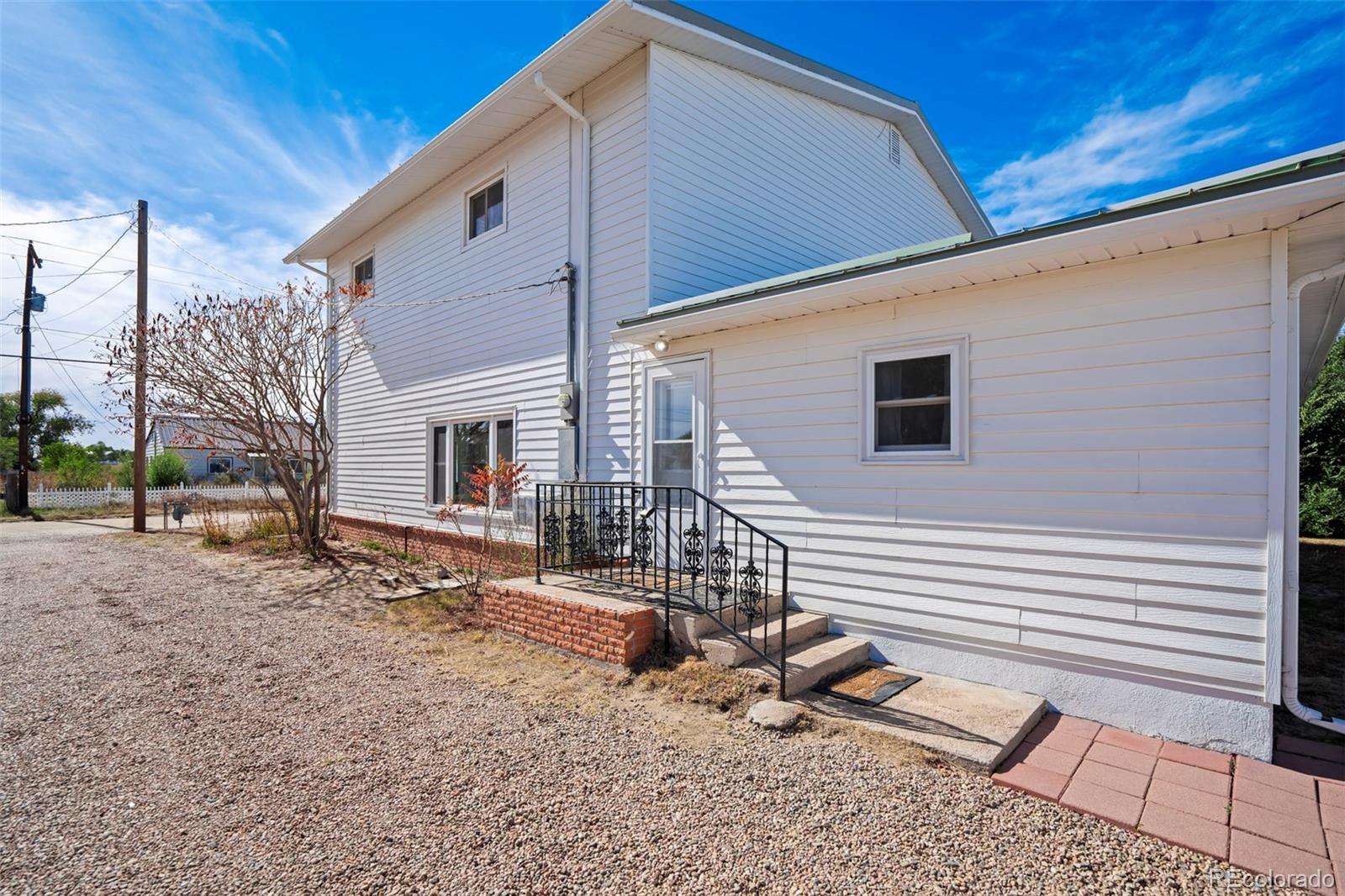 1284 Thompson Street Limon, CO 80828 - Photo 28 of 49 a backyard of a house with seating space