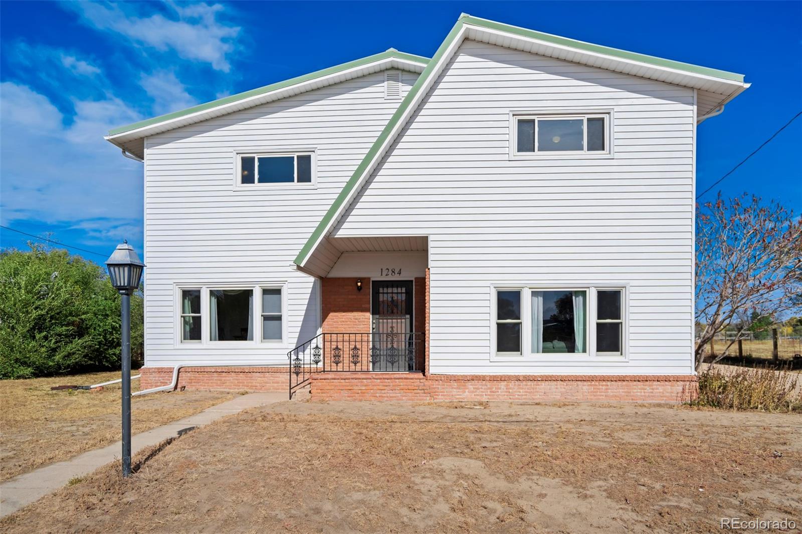 1284 Thompson Street Limon, CO 80828 - Photo 31 of 49 a house with large space that has windows