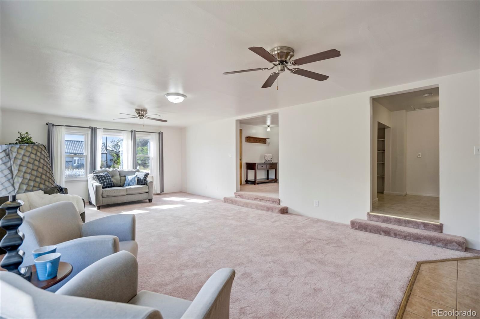 1284 Thompson Street Limon, CO 80828 - Photo 34 of 49 a living room with furniture and a window