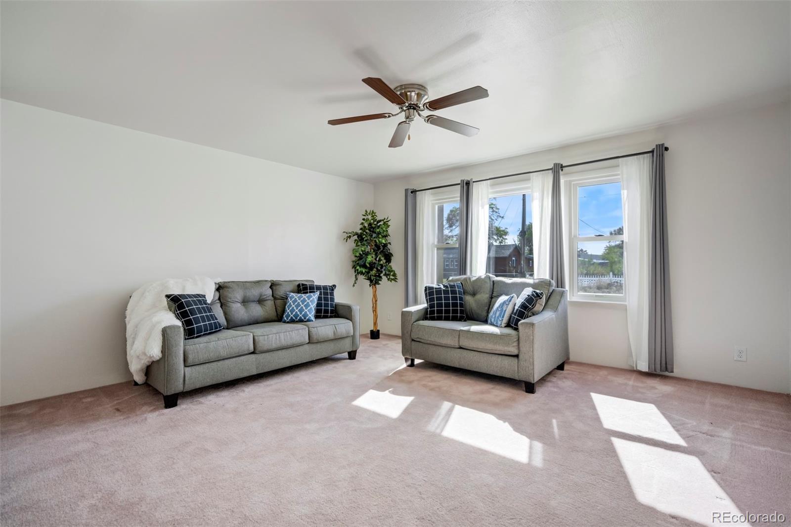 1284 Thompson Street Limon, CO 80828 - Photo 35 of 49 a living room with furniture and a large window