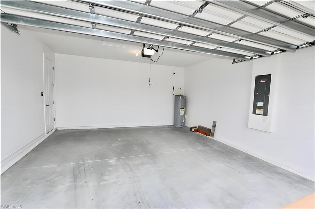 1063 Enbrook Loop Naples, FL 34114 - Photo 19 of 26 a view of a garage
