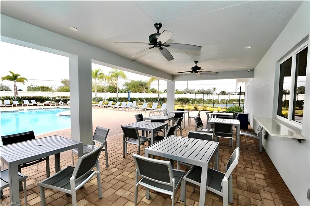 1063 Enbrook Loop Naples, FL 34114 - Photo 20 of 26 a view of a dining room with furniture window and outside view