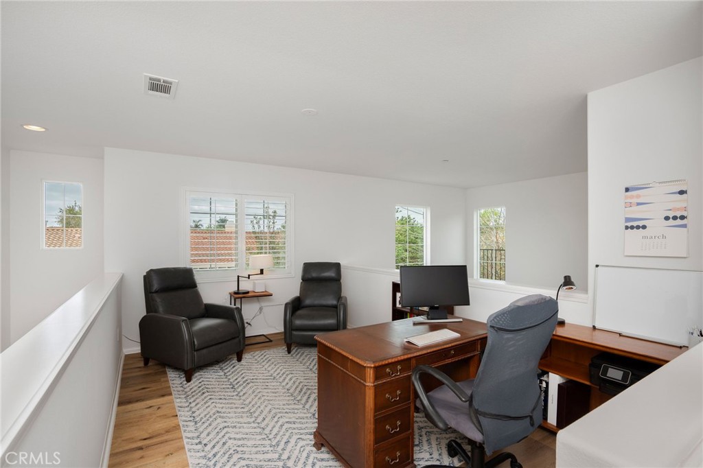 3604 Dunkirk Drive Oxnard, CA 93035 - Photo 14 of 32 a view of a workspace with furniture and a window