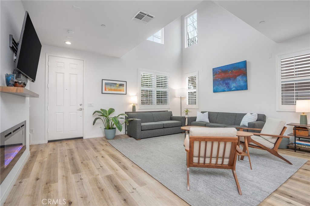 3604 Dunkirk Drive Oxnard, CA 93035 - Photo 2 of 32 a living room with furniture and a flat screen tv