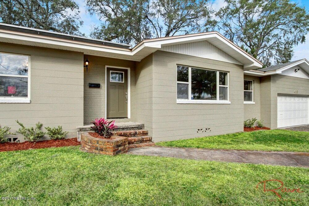 413 Baisden Road Jacksonville, FL 32218 - Photo 2 of 31 a front view of a house with garden