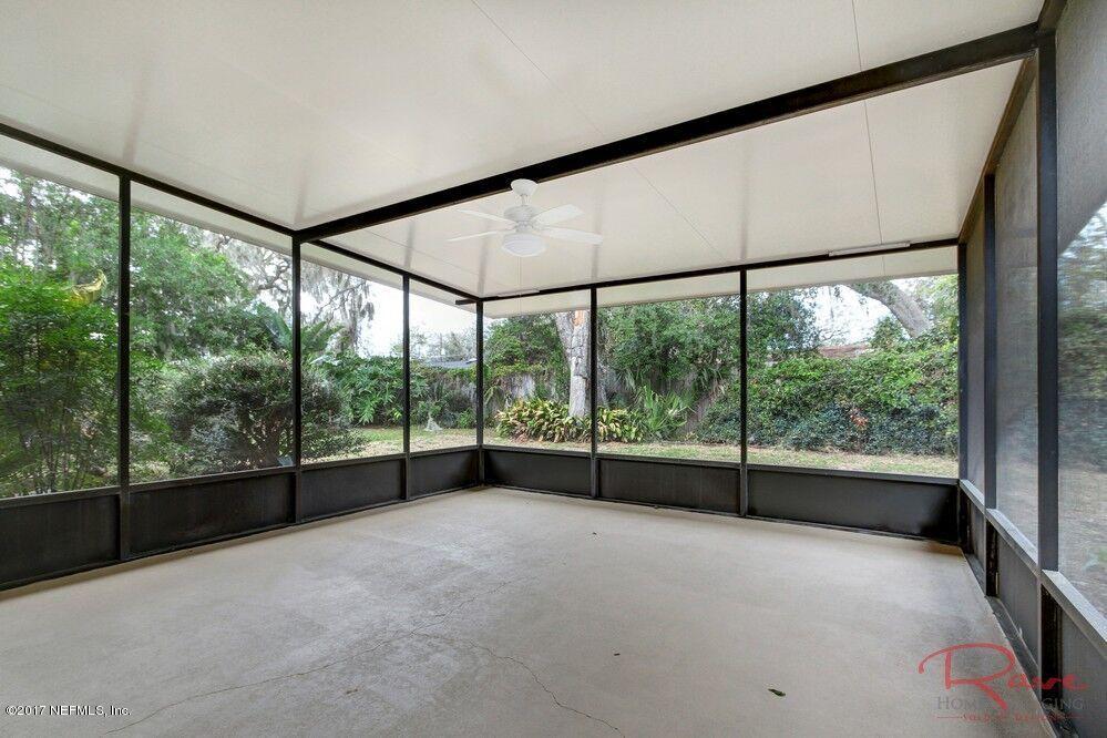 413 Baisden Road Jacksonville, FL 32218 - Photo 28 of 31 an empty room with large windows