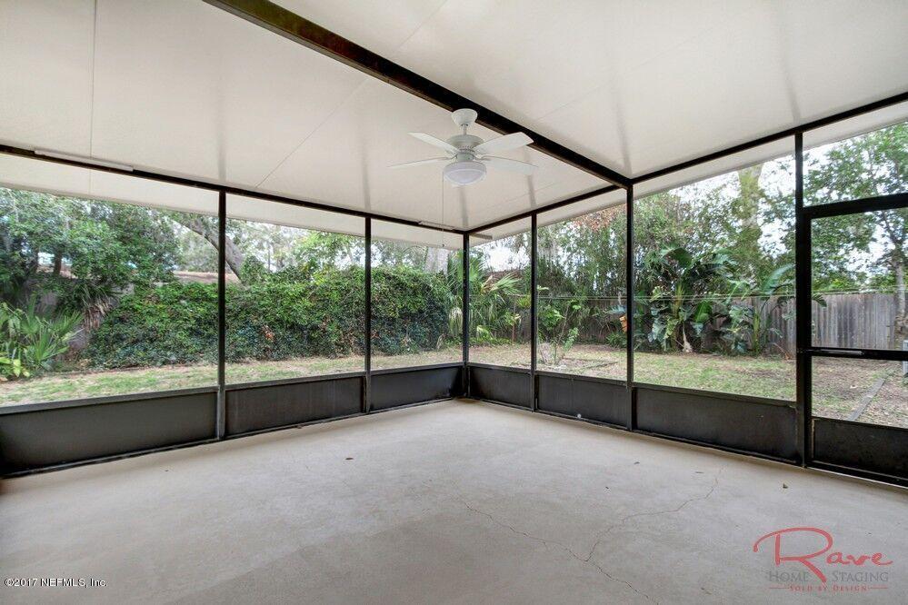 413 Baisden Road Jacksonville, FL 32218 - Photo 29 of 31 a view of empty room with sliding windows