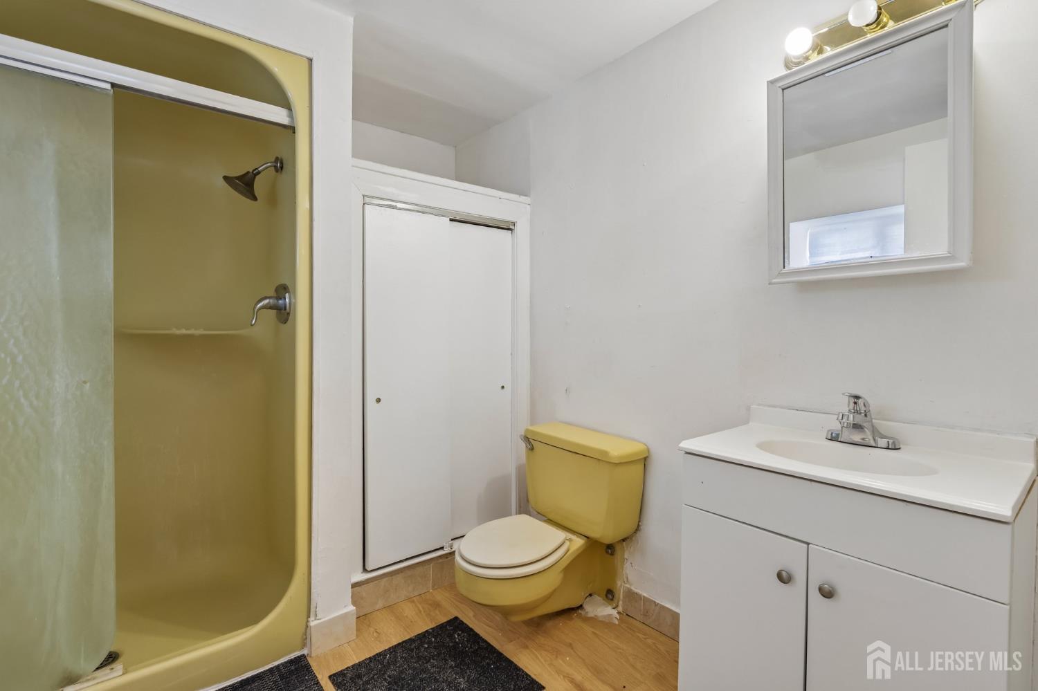 36 Henry Street Edison, NJ 08820 - Photo 37 of 42 a bathroom with a sink toilet and shower